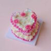 Lovely Heart-Shaped Mini Cake Set: Crafted with Pink and Yellow Icing