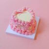 Charming Yellow Heart Mini Cake Kit: Adorned with Pink Bows and Gold Beads Charming Yellow Heart Mini Cake Kit: Adorned with Pink Bows and Gold Beads