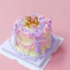 Customizable Celebration Mini Cake Kit: Yellow Base with Pink, Purple, and Yellow Icing Customizable Celebration Mini Cake Kit: Yellow Base with Pink, Purple, and Yellow Icing