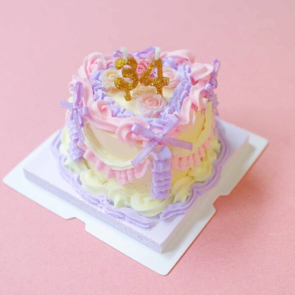 Customizable Celebration Mini Cake Kit: Yellow Base with Pink, Purple, and Yellow Icing