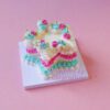 Delightful Star Mini Cake Kit Decorated with Pink, Blue, and Yellow Icing Delightful Star Mini Cake Kit Decorated with Pink, Blue, and Yellow Icing