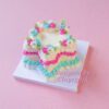 Delightful Star Mini Cake Kit Decorated with Pink, Blue, and Yellow Icing Delightful Star Mini Cake Kit Decorated with Pink, Blue, and Yellow Icing