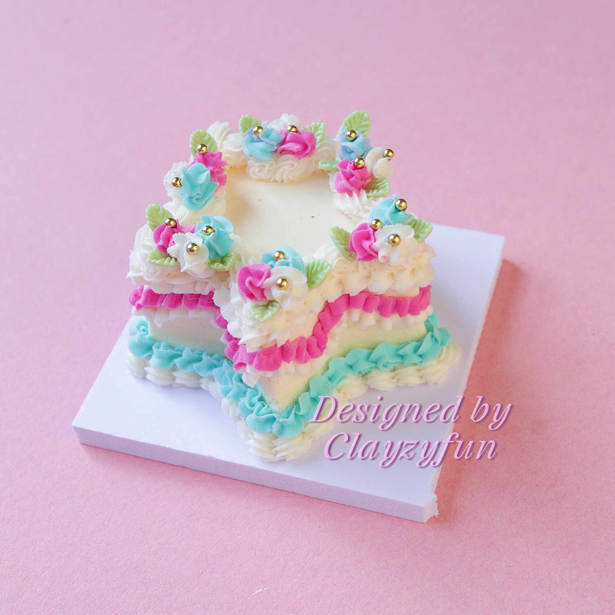 Delightful Star Mini Cake Kit Decorated with Pink, Blue, and Yellow Icing Delightful Star Mini Cake Kit Decorated with Pink, Blue, and Yellow Icing