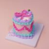 Whispers of Spring A Heart Cake Wrapped in Pastel Elegance