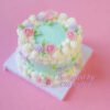 Minty Blossom Delight: A Cake Wrapped in Floral Beauty